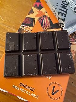 Montezuma's HAPPY HIPPY - DARK CHOCOLATE WITH ORANGE & GERANIUM